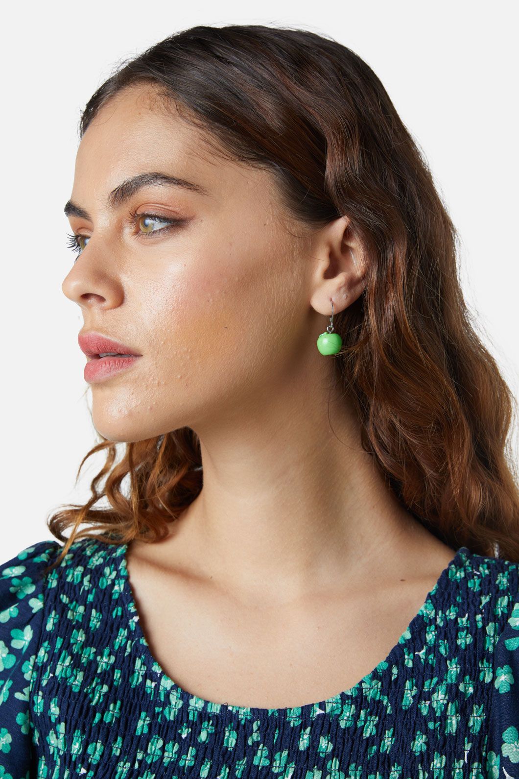 Green huggie sale earrings